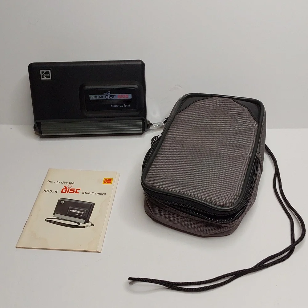 Kodak Disc 6100 PARTS camera with instruction booklet and generic case